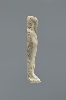 Ushabti, Mummy-shaped figurine, standing on a base with a flat back. Arms crossed on the chest,