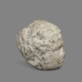Head of a young man, unknown Greek workshop. A small head of a young man, probably a fragment of a