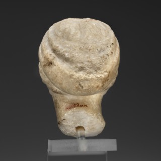 Head of a woman in a bonnet; Greek sculpture of a female portrait showing hairstyle details; 5th