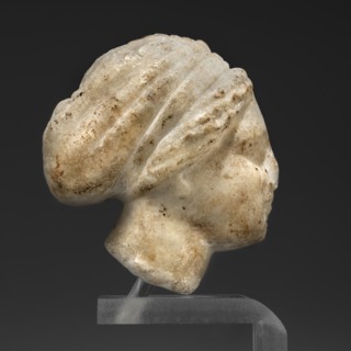 Head of a woman in a bonnet; unknown creator; Greek sculpture; female portrait; hairstyle; 5th