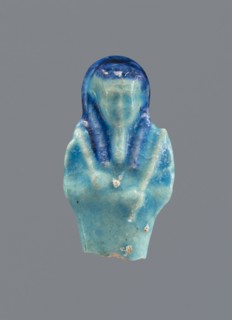 Shabti, Mummy-shaped figurine, funerary gift, back supported by a pillar/pilaster. Legs missing.