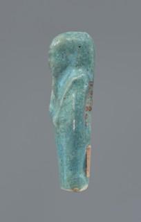 Shabti, mummy-shaped figurine supported at the back on a pillar. Legs missing from the knees down.
