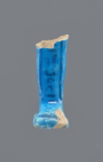 Shabti legs, Mummy-shaped figurine fragment preserved from the knees down. Feet rest on a base;