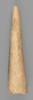 Mosaic cone; decorative architectural element from the decoration of facades of cult buildings.