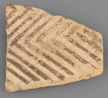Fragment of a bowl spout, unknown northern Mesopotamian workshop; painted pottery with geometric