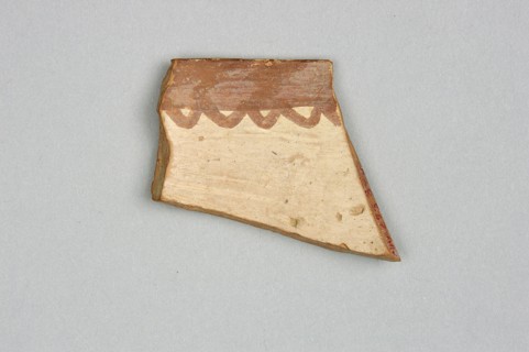 Fragment of a bowl, unknown Northern Mesopotamian workshop; painted pottery with geometric motifs,