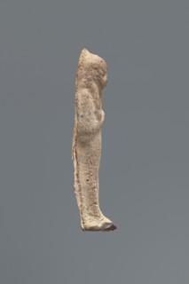 Shabti, Mummy-shaped funerary figurine, made carelessly and impressed in a mold. Hands folded on