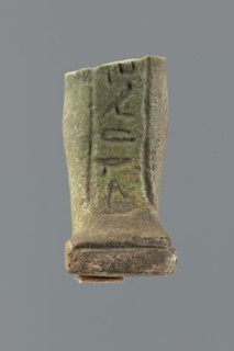 Shabti legs, mummy-shaped funerary figurine fragment: only the legs preserved from the knees down.