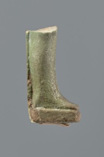 Shabti legs, Mummy-shaped funerary figurine fragment: legs preserved from knees down. Feet rest on