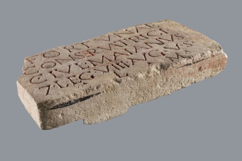 Slab with a Latin votive inscription for Fortuna Conservatrix. Limestone slab with a smoothed front