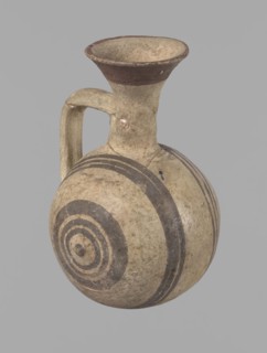 Cypriot gourd jug. A small vessel with a barrel-shaped gourd-shaped body, without a foot, with a