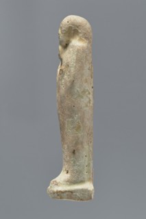 Ushabti, mummy-shaped figurine, funerary gift; standing on a base, back supported by a narrow flat