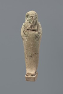 Ushabti, Mummy-shaped figurine, standing on a base with the back supported by a flat pillar. The
