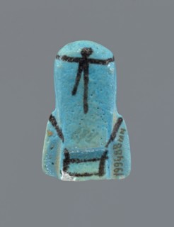 Ushabti, Mummy-shaped figurine, preserved head and fragment of torso. Arms crossed on the chest,