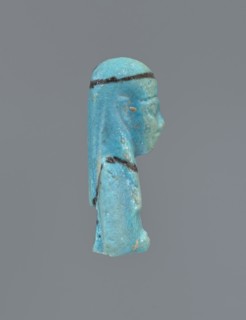 Ushabti, mummy-shaped figurine, funerary gift. Mummy-shaped figurine with preserved head and