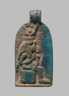 Plaque with a relief image of Isis sitting on a throne, turned to the right and holding infant