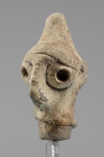 Idol head, unknown Syrian workshop, terracotta, idols, Northwestern Syria. Male head in a conical
