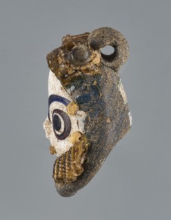Apotropaic pendant in the shape of a male head, bearded head pendant, pendant in the form of a