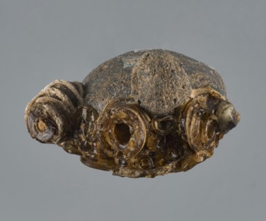 Apotropaic pendant in the shape of a male head; bearded head pendant; pendant in the form of a