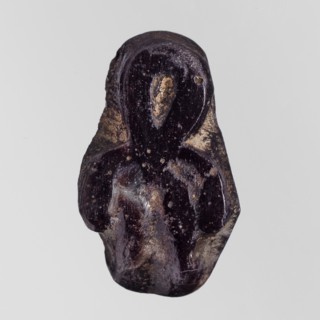 Amulet - tit;, protective amulet in the form of a tit knot with hieroglyphs; Ptolemaic Period,