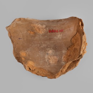 Mask of the god Bes — fragment of a vessel;, Bes Egyptian deity. Egyptian art; Roman period,
