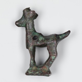Figurine of a goat, unknown Near Eastern workshop. Ibex animal figurine in metals/metalwork. Goat