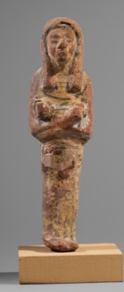 Ushabti, Restitution. Hieroglyphs; funerary figurine; wig; hoes; grave goods; mummy-shaped figurine