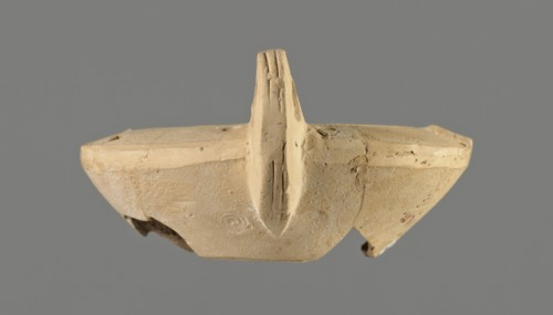 Oil lamp with an image of Helios, unknown Greek workshop, Single-burner oil lamp, made from a mold.