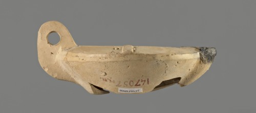 Oil lamp with an image of Helios. Single-burner Roman oil lamp, Broneer Lamp type XXVII C, made