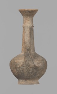 Jug, Cypriot pottery, Base Ring Ware I, 1600–1450 BC. Jug with an echinus-shaped foot; a biconical,