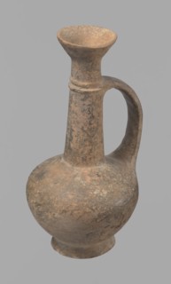 Jug, Cypriot pottery, Base Ring Ware I, 1600–1450 BC, Cyprus. Jug with an echinus-shaped foot; a