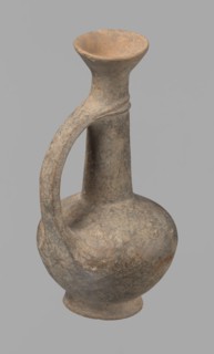 Jug. Cypriot pottery, Base Ring Ware I. Jug with an echinus-shaped foot; a biconical, slightly