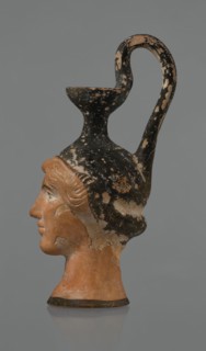 Oinochoe in the shape of a woman's head, Greece, Attica, ca. 450 BC. Oinochoe vessel fashioned from