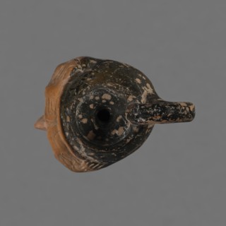 Oinochoe in the shape of a woman's head, Greece, ca. 450 BC, Attica. Oinochoe wine jug shaped as an