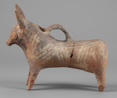 Bull-shaped vessel. Vessel in the shape of a bull standing on widely spaced legs. The cylindrical