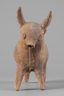 Bull-shaped vessel, Bull-shaped vessel in the shape of a bull standing on widely spaced legs. The