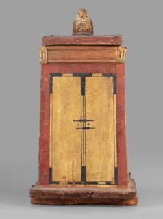 Canopic box with the falcon Sokaris on the roof; falcons, djed pillars, tit iconography; naos;