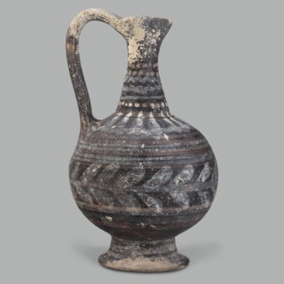 Oinochoe, unknown Cypriot workshop, Arsinoe Cyprus. Oinochoe on a cup-shaped foot with a spherical