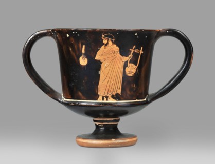 Red-figure kantharos with a depiction of an ephebe with an aryballos and a Greek inscription