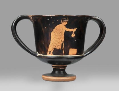 Red-figure kantharos with a depiction of an ephebe with an aryballos and a Greek inscription