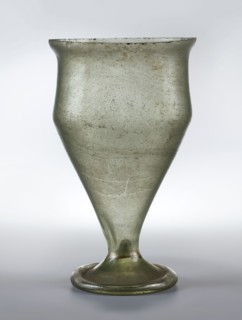 Chalice with a strongly elongated bowl widening upwards to 2/3 of its height, slightly recessed