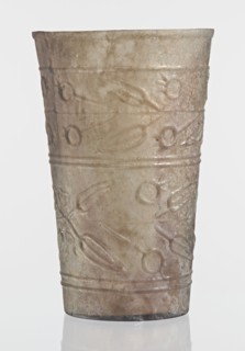 Glass decorated with a leaf and fruit motif;, Goluchów Greater Poland Voivodeship; transparent,