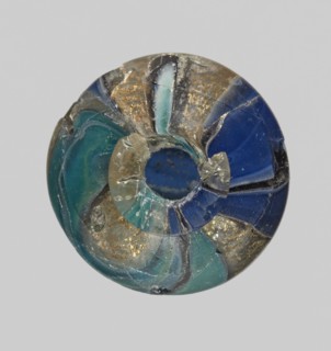 Unguentarium with carnation with a gold ribbon; with a bulging belly. Unguentarium. Mosaic glass