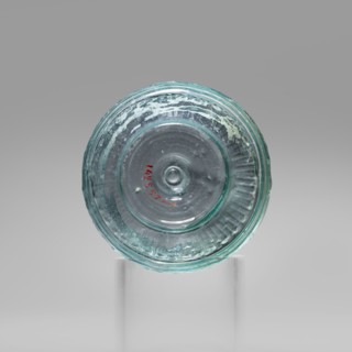 Bowl with Greek inscription. Glass bowl made of transparent, light blue glass with a Greek