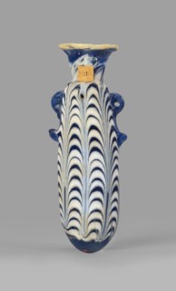 Alabastron, Egyptian workshop, — 6th–5th century BC. Opaque dark blue glass decorated with