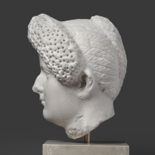 Portrait of a Roman woman, female portrait, Roman sculpture, hairstyle: head with a broad, round