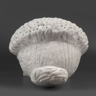 Portrait of a Roman woman, Head with a broad face and an elaborate hairstyle: hair twisted into