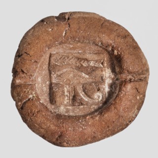 Mold for an amulet of the eye of Horus udjat. Hemispherical mold with a representation of the udjat
