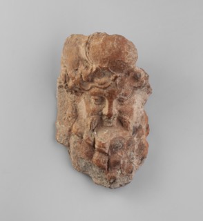 Mask of Bearded Dionysus. Miniature mask depicting Dionysus with an expressive nose, full lips in a