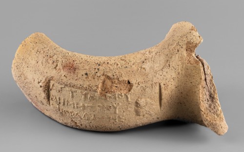 Fragment of a spout and vice from a Sinopean transport amphora with a three-line stamp depicting